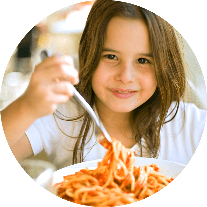 Young girl enjoying her food